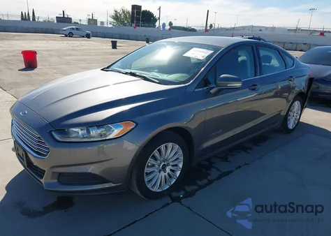 2014 Ford Fusion Hybrid Se z USA, uszkodzony, nr VIN 3FA6P0LU2ER185458